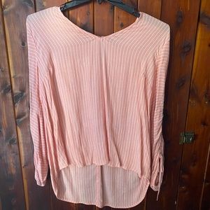 Loosely fitted, runs big